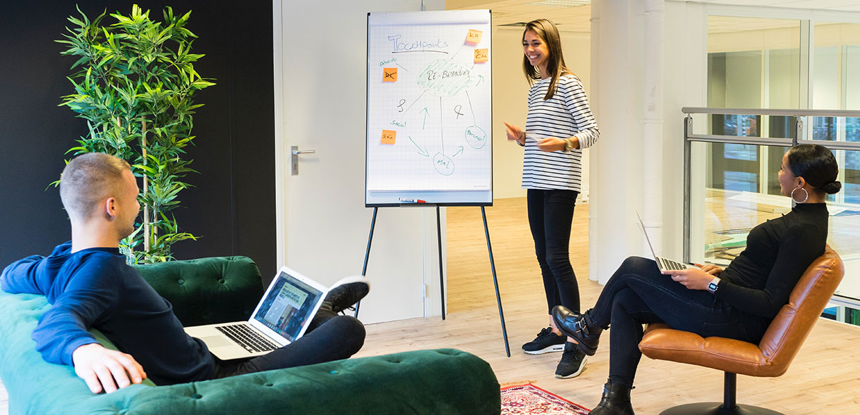 Woman giving presentation - Bridges 5.0 services-3